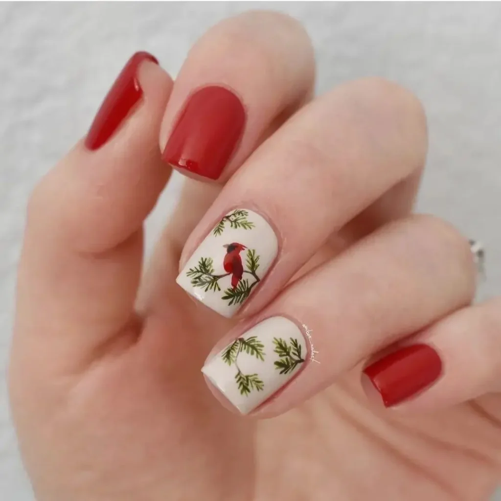 Red cardinal nail design for a simple winter manicure. 