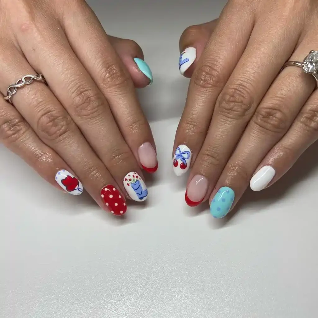 Cute red and blue Western nails with 90s nail art. 