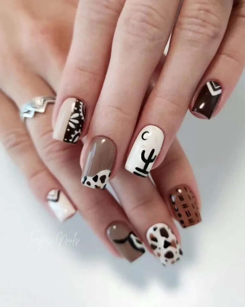 Brown and white Western nails with cactus and geometric nail art. 