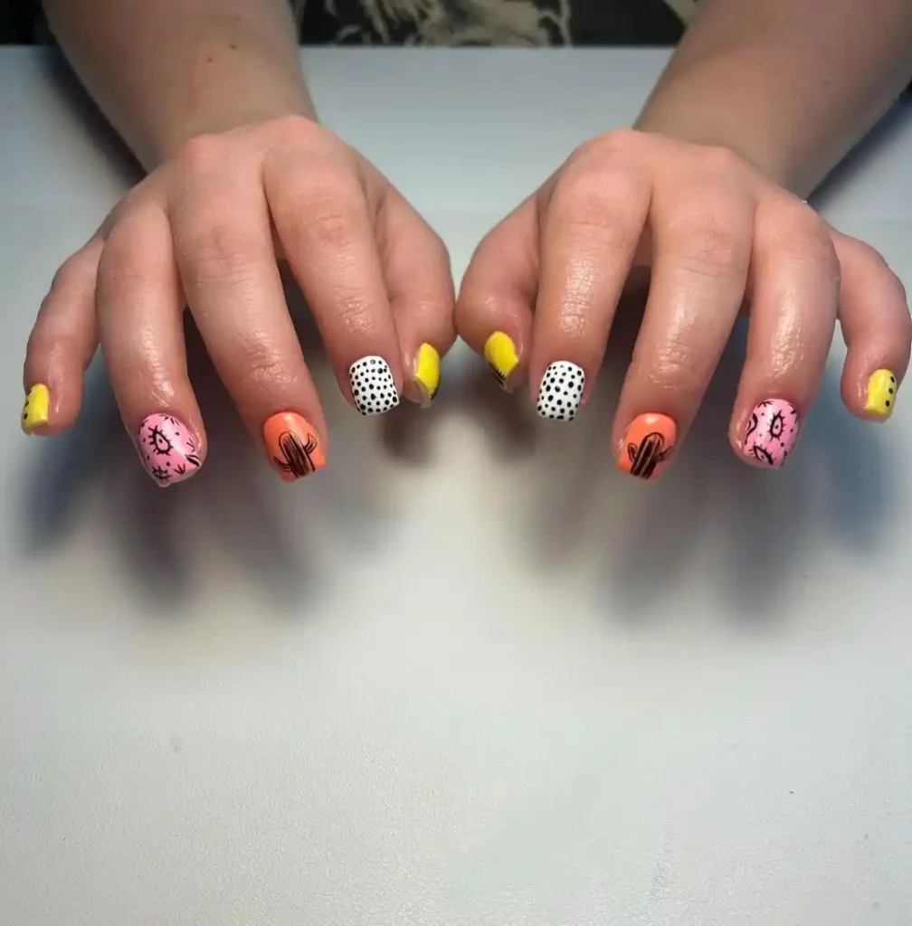 Cactus and dotted print nail art on colorful short nails