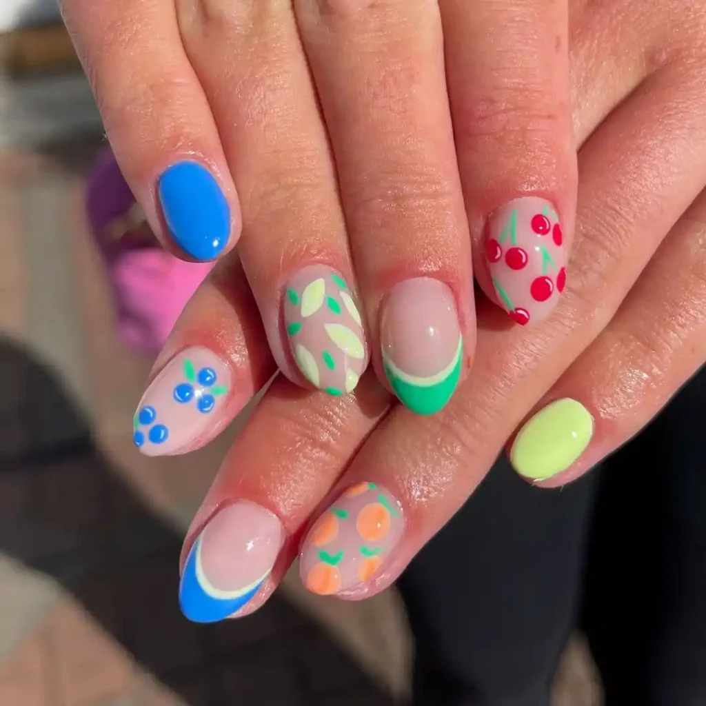 Cute summer fruits nail art on short nails. 