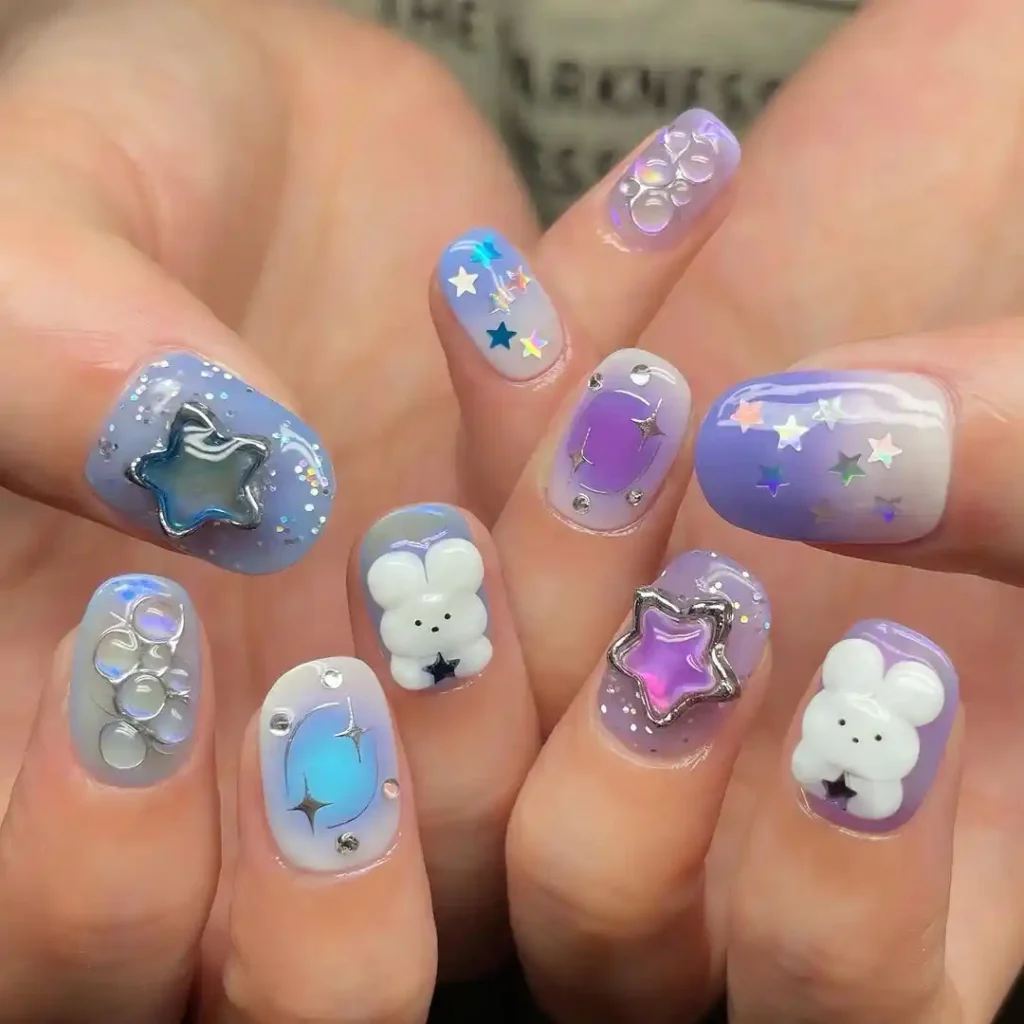 Purple and blue rabbit nails for a cute summer manicure. 