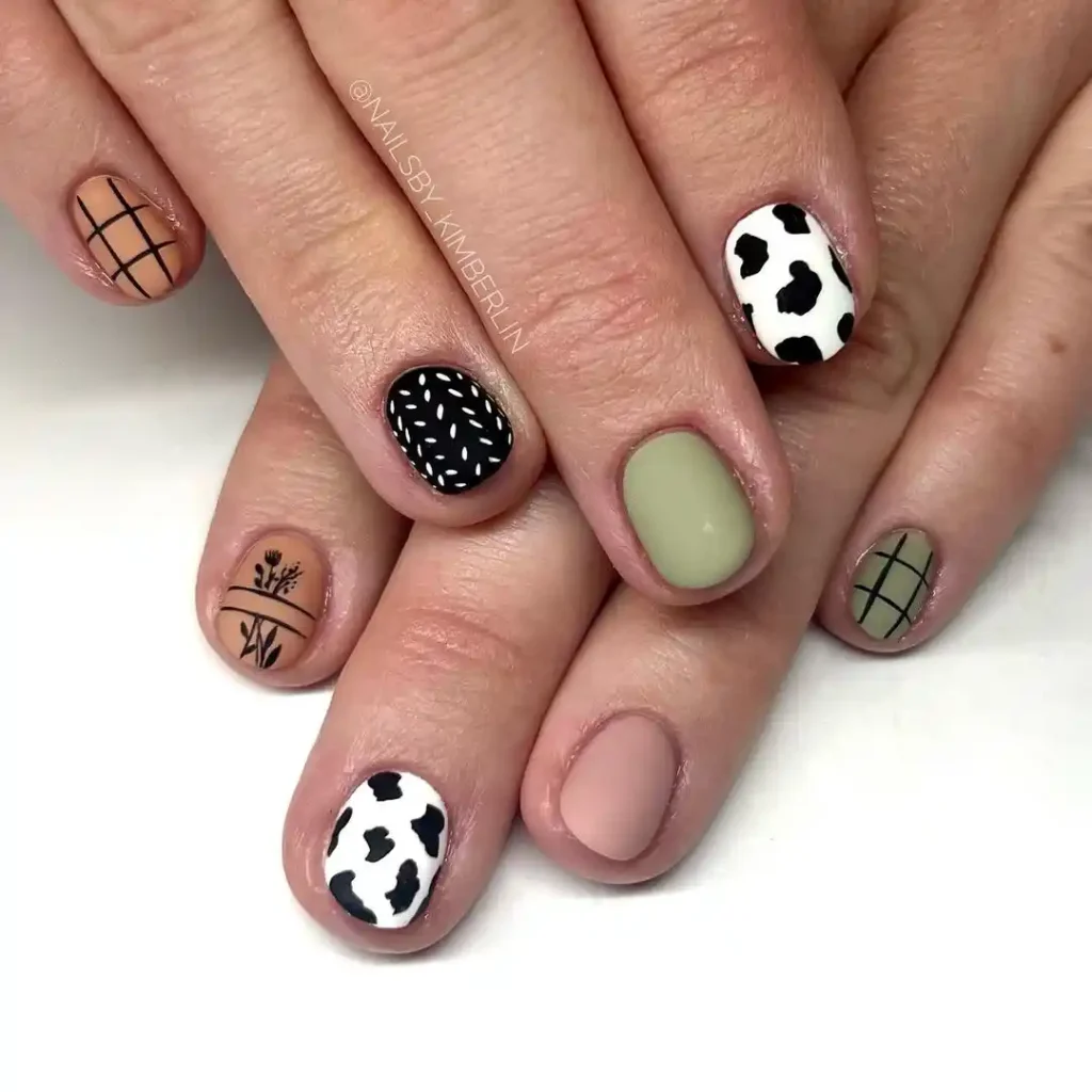  Fall nails with matte earthy colors and Western nail art.