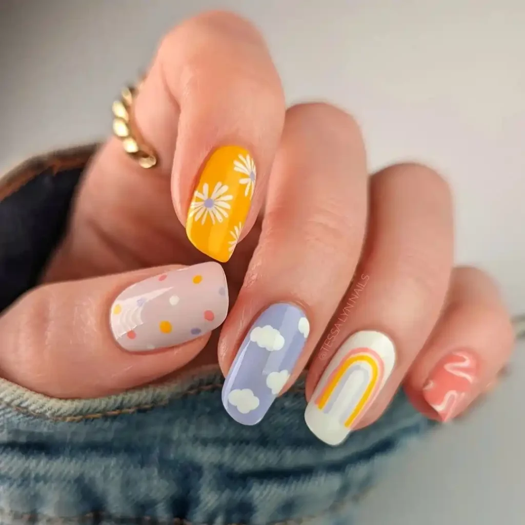 Cute summer manicure with mix-and-match nail art and squoval nail shape. 