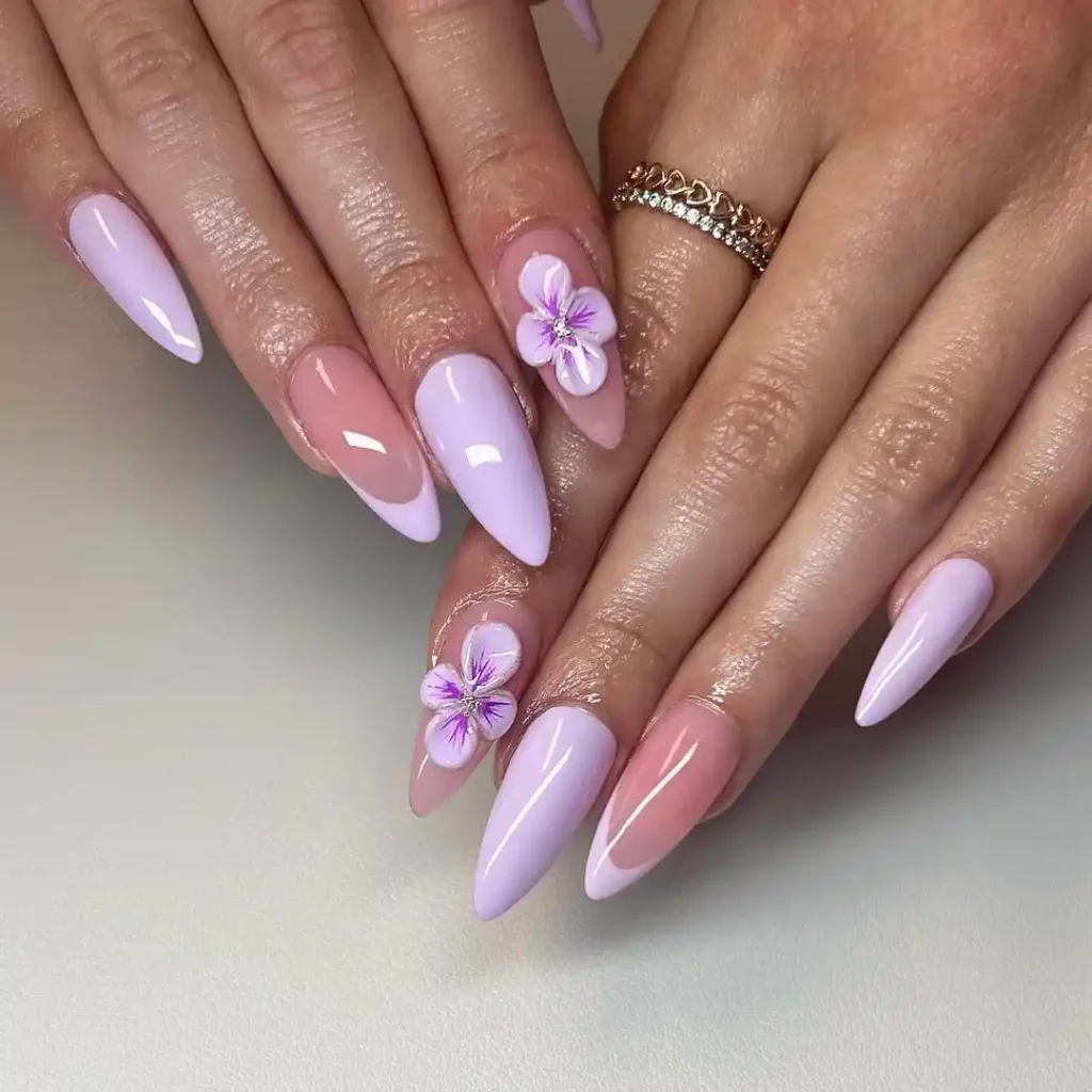 Almond acrylic flower nails with purple nail color are best for springs. 