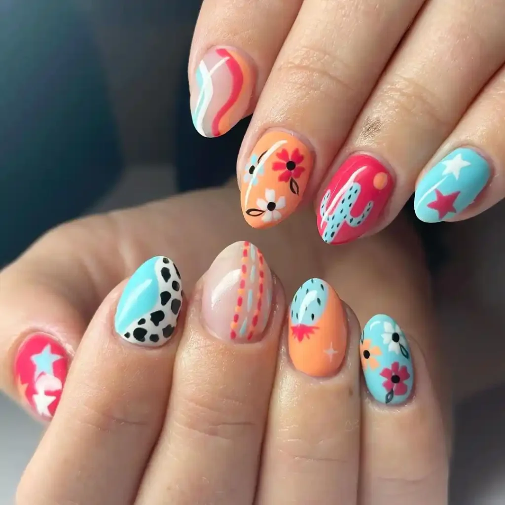 Cute colorful western nail designs on short nails. 