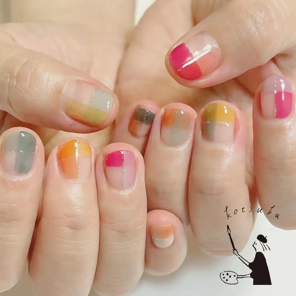 Cute color block and plaid nail art with colors like pink, yellow, green, and blue. 