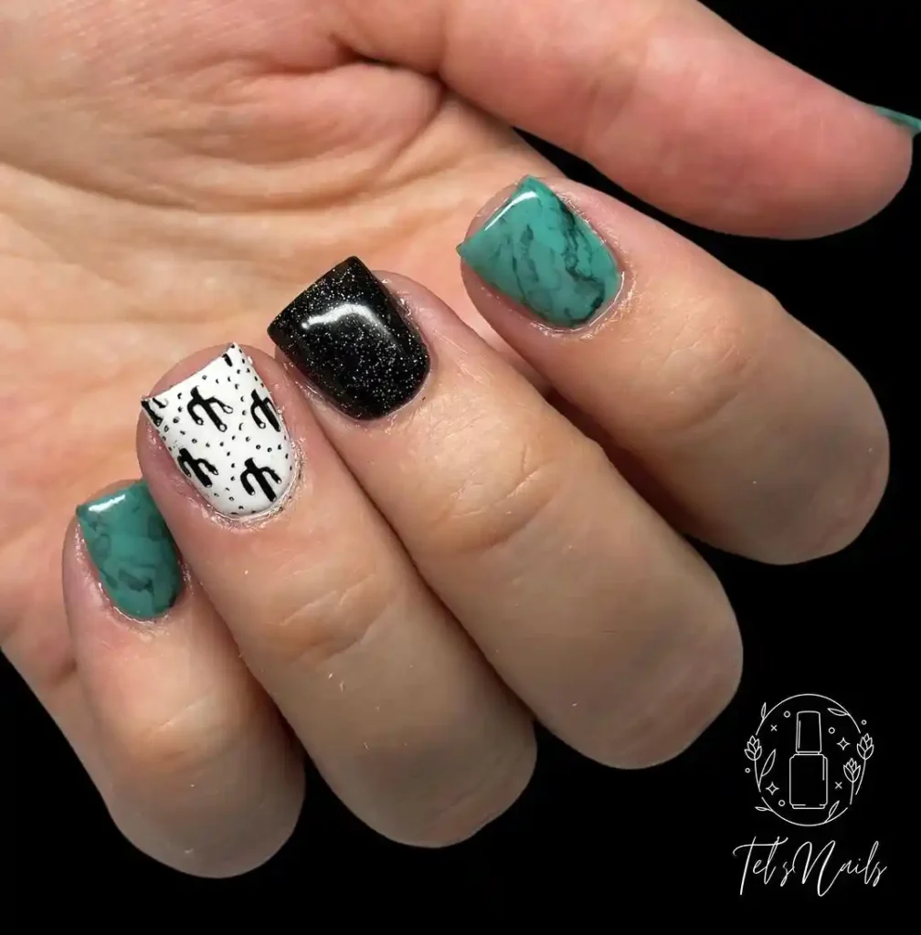 Beautiful turquoise nails with cacti, marle, and glitter nail art.