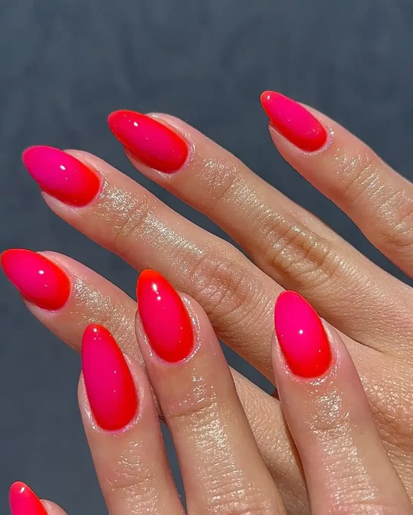 Bright red and pink aura nails for summer.