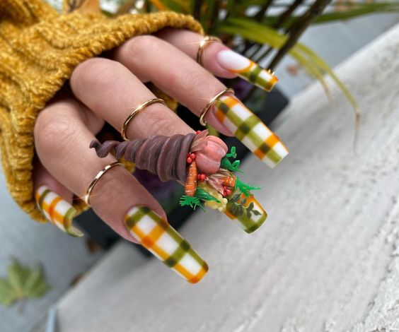 Plaid long acrylic nails with 3D vegetable embellishments