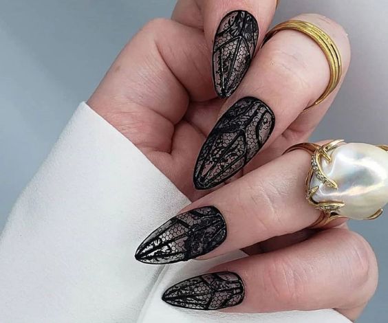 Black lace nail art idea for Halloween. 