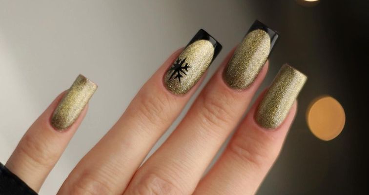 Gold glitter square nails with a black French manicure. 
