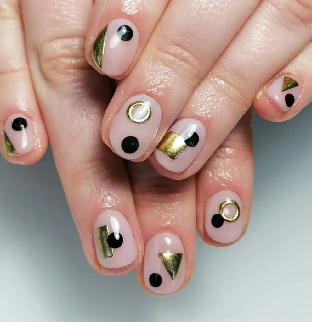 Cute short gel natural nails with minimal geometric nail art.