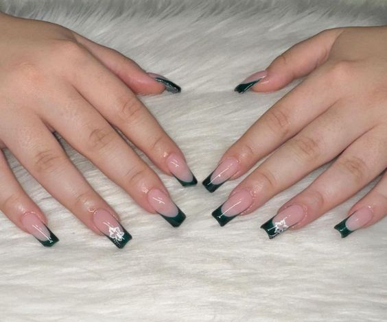 Emerald green French tips and hibiscus flower art. 