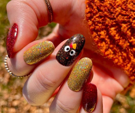 Skittle nails for Thanksgiving with glitter colors and turkey design