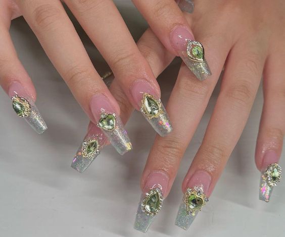 Glitter green ombre and 3D crystals nail art on acrylic nails. 
