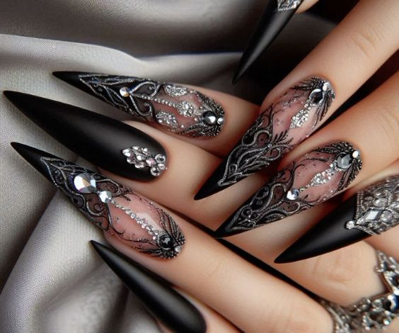 Long stiletto nails with black nail polish and 3D.