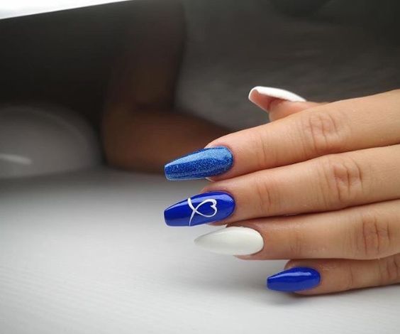 Dark blue and white ballerina nails with heart design.