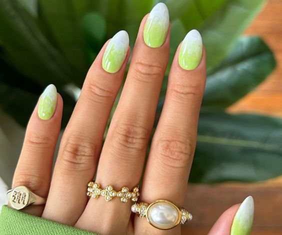 Ombre nails with lime green and white nail colors. 