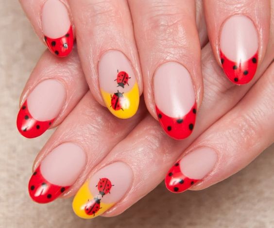 Cute ladybug designs for short natural nails. 