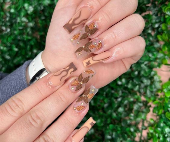 Brown Thanksgiving nails with acrylic leaves