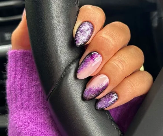 Dark purple and nude glitter nails for a magical birthday manicure.