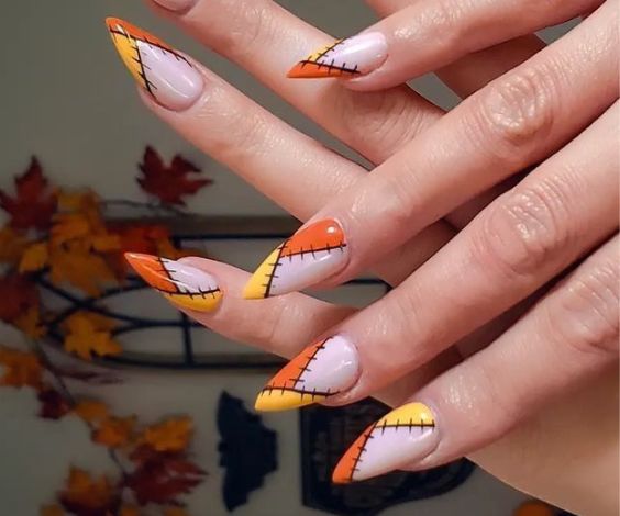 Cute patchwork nails on stiletto nail shape. 