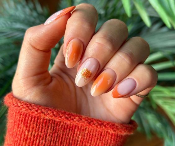 Pink ombre nails with cat-eye French tips. 