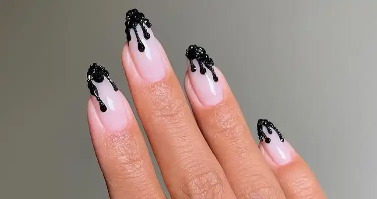 Black Halloween nails with 3D dripping art and rhinestones. 
