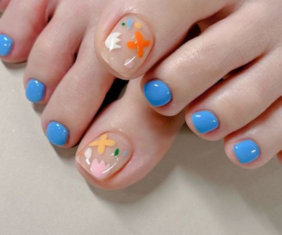 Gel pedicure with gel nail polish and cute designs. 
French Pedicure:
