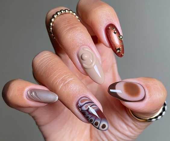 Acrylic nails for winter with brown nail art