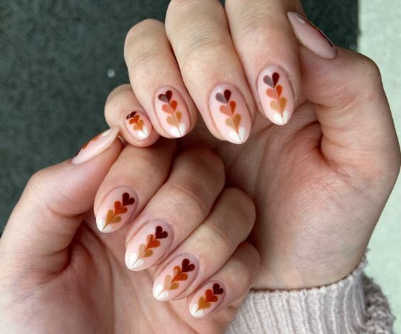 Neutral heart nail designs for winter season