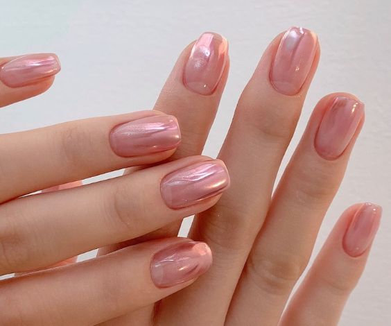 Rose metal nails with a shiny metallic finish